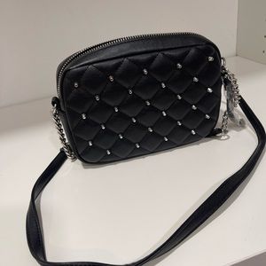 Small black shoulder bag with decorative studs